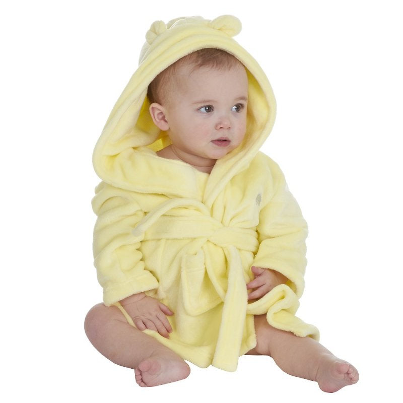 Baby wearing yellow bathrobe