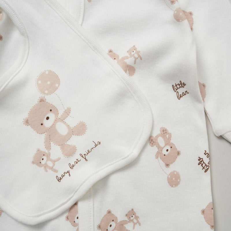 zoom up of bear print bib and bodysuit for baby