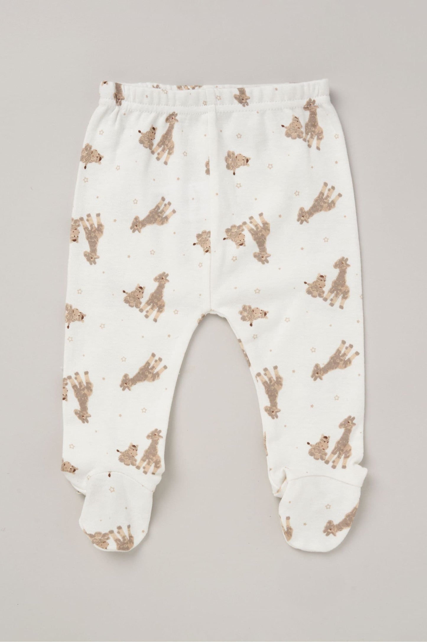 Giraffe and zebra print white baby footed bottoms. 