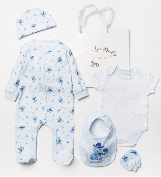 Blue baby gift set with cowboy bear print including bib, mittens, hat, sleepsuit and vest